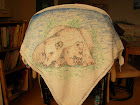 knitted shawl with picture painted on it of polar bear