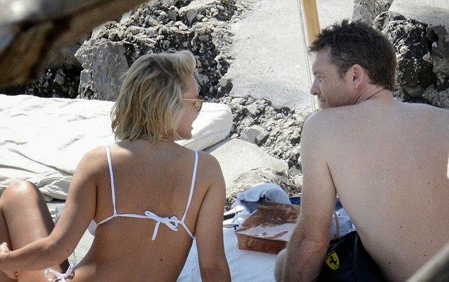 Lara Bingle Does Relax in a White Bikini on the beach in Italy Winner or loser? the 26-year-old didn’t wanted her bright day going deeply to loneliness as she drew people’s attention in a white bikini adorned with the actor boyfriend, Sam Worthington in Capri, Italy on Wednesday, June 11, 2014.