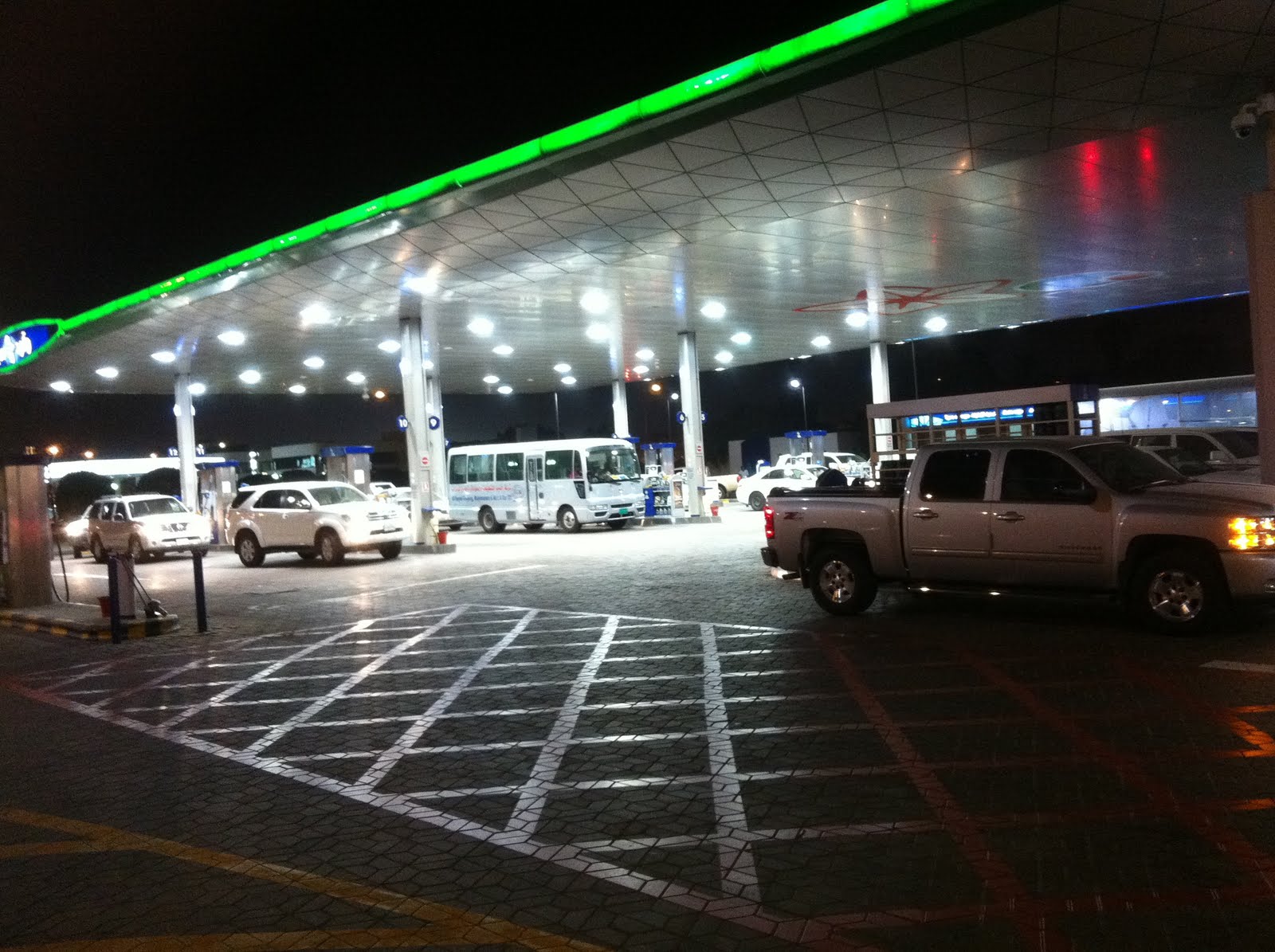 Qatar Culture Club WOQOD Petrol Station in Doha Examining Social
