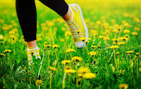 playing in the grass yellow shoes