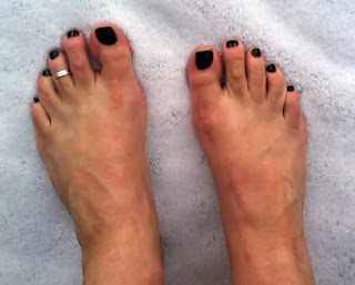 man with painted toes barefoot in the snow guy barefoot in the snow with painted toes