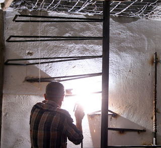 Welding the step to the wall support Welding the step to the wall support