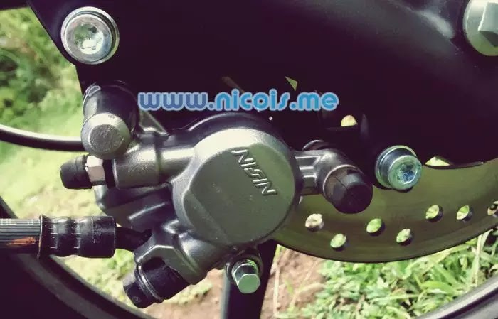 Tampilan rem cakram depan New Supra X 125 FI 2014: Nissin caliper 1 piston Tampilan rem cakram depan New Supra X 125 FI 2014: Nissin caliper 1 piston