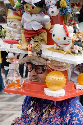 Harajuku Ojisan in a crazy traffic cone hat