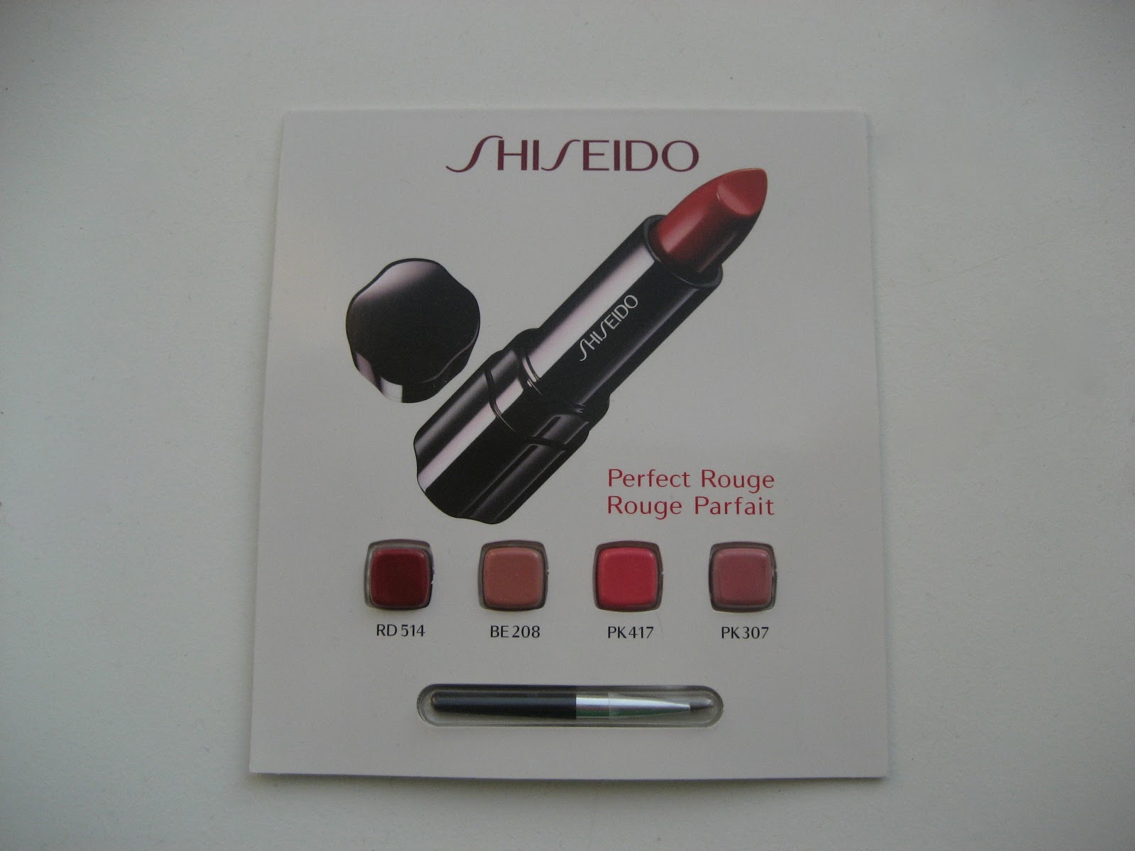 delicate hummingbird. Shiseido lipsticks 2 one more sampler card.