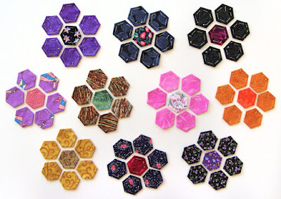 arranged hexie flower petal & centers, new hexie quilt by Robin Atkins