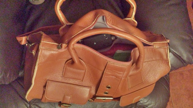 http://www.dresslily.com/buckle-and-solid-color-design-handbag-for-women-product174789.html