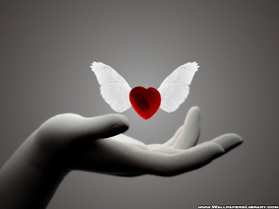 small flying red heart