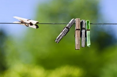 hide your washing when selling your house Pegs on a washing line