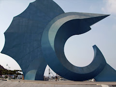 Me Holding Up the Sail Fish Statue