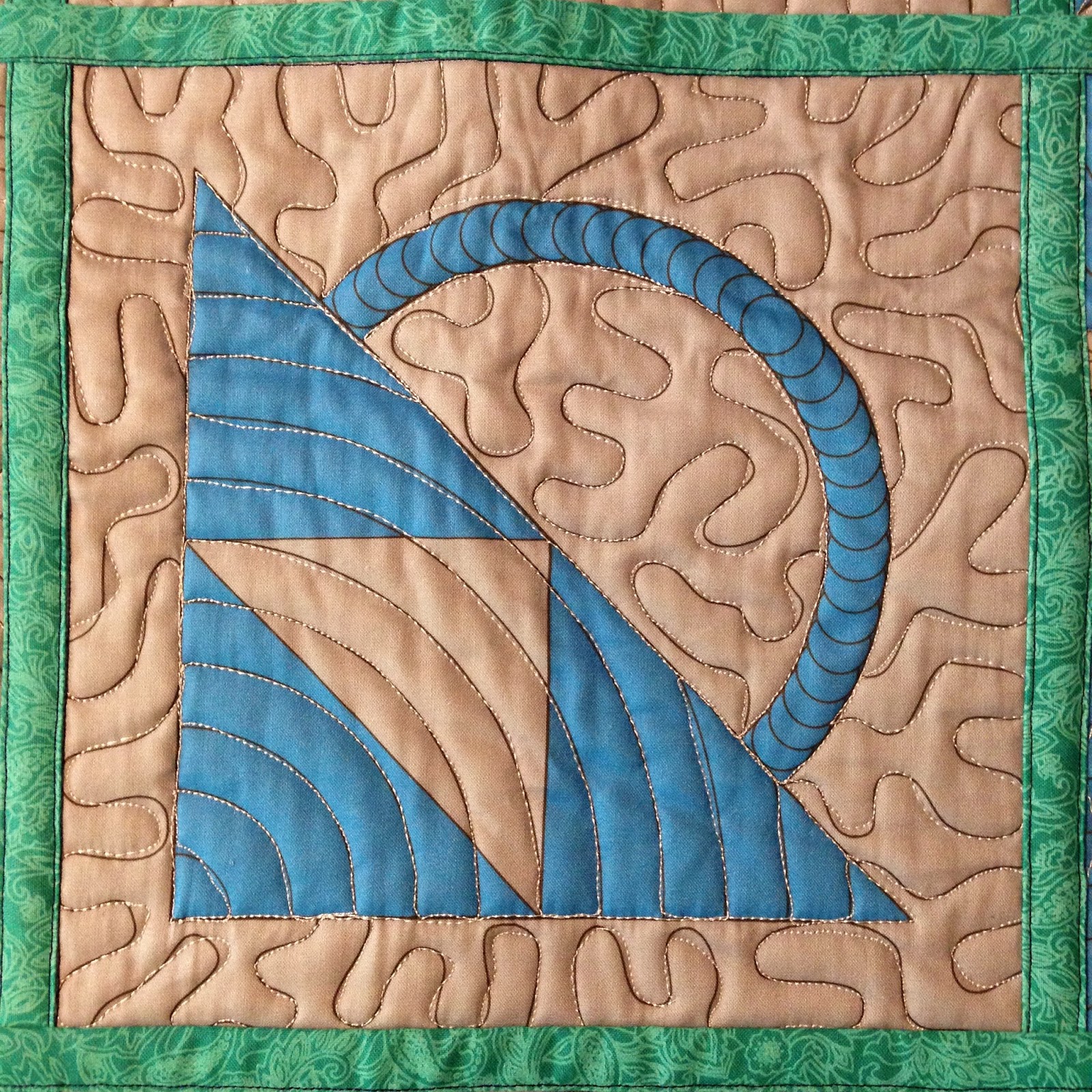 Josh's echo shell and stippling in a basket block