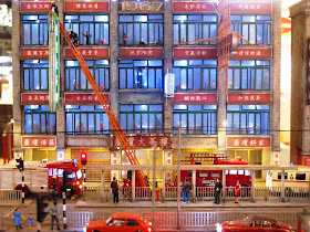 Model Hong Kong office building and street.