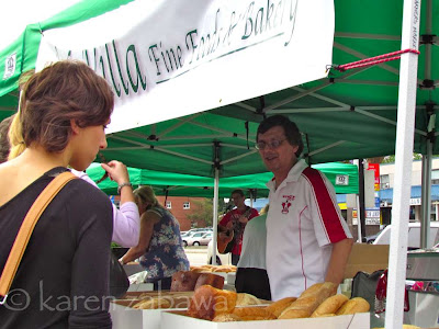 John Bozzo, owner La Villa Fine foods and Bakery, Port Credit. La Villa bakery farmers market stall, Port Credit ON.