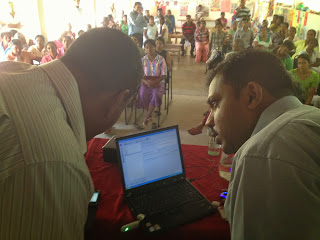 Nuwan and Chandana working with FLSMS