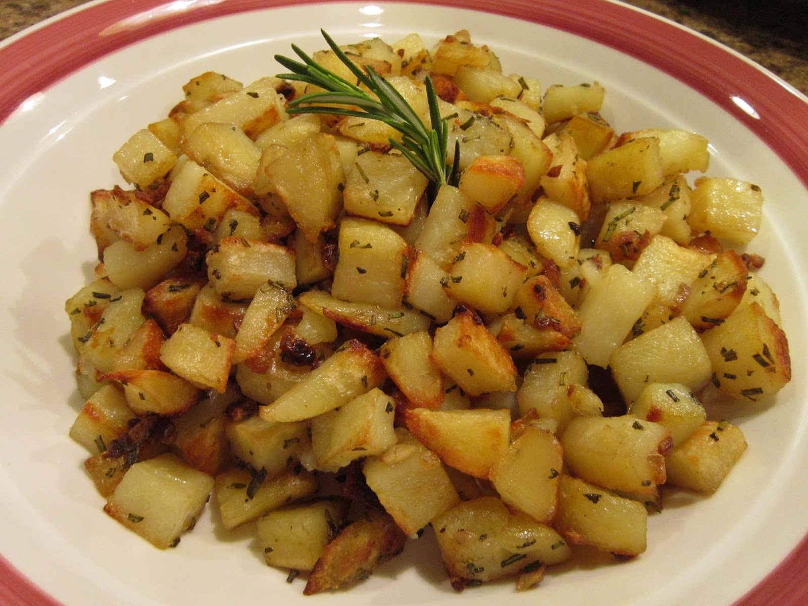 The Italian Next Door OvenRoasted Potatoes Sprinkled with Rosemary and Garlic