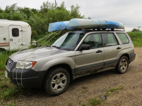 kayaks on car