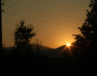 The sun rises over the mountains The sun rises over the mountains
