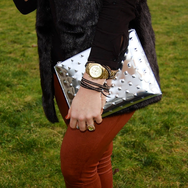 Ela Editor's Pouch clutch, Michael Kors gold watch and an Alden Rae bracelet