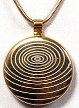 Am gold pendant