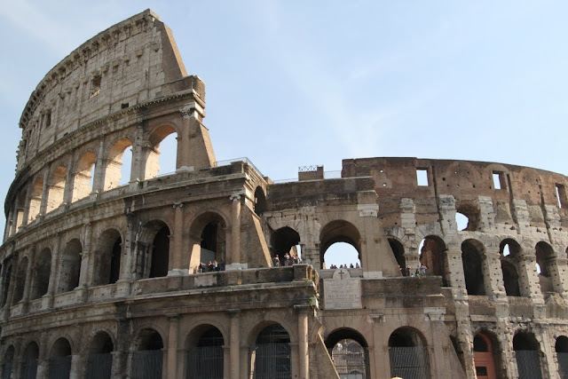The top exterior wall structure of the Roman Colosseum in Rome, Italy The top exterior wall structure of the Roman Colosseum in Rome, Italy