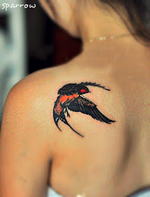 A flying sparrow tattoo on the back