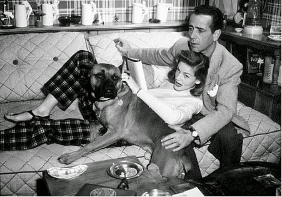 Humphrey Bogart and Lauren Bacall relaxing at home.