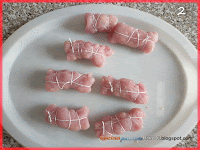 Involtini di tacchino con ripieno di  prosciutto cotto e salame piccante