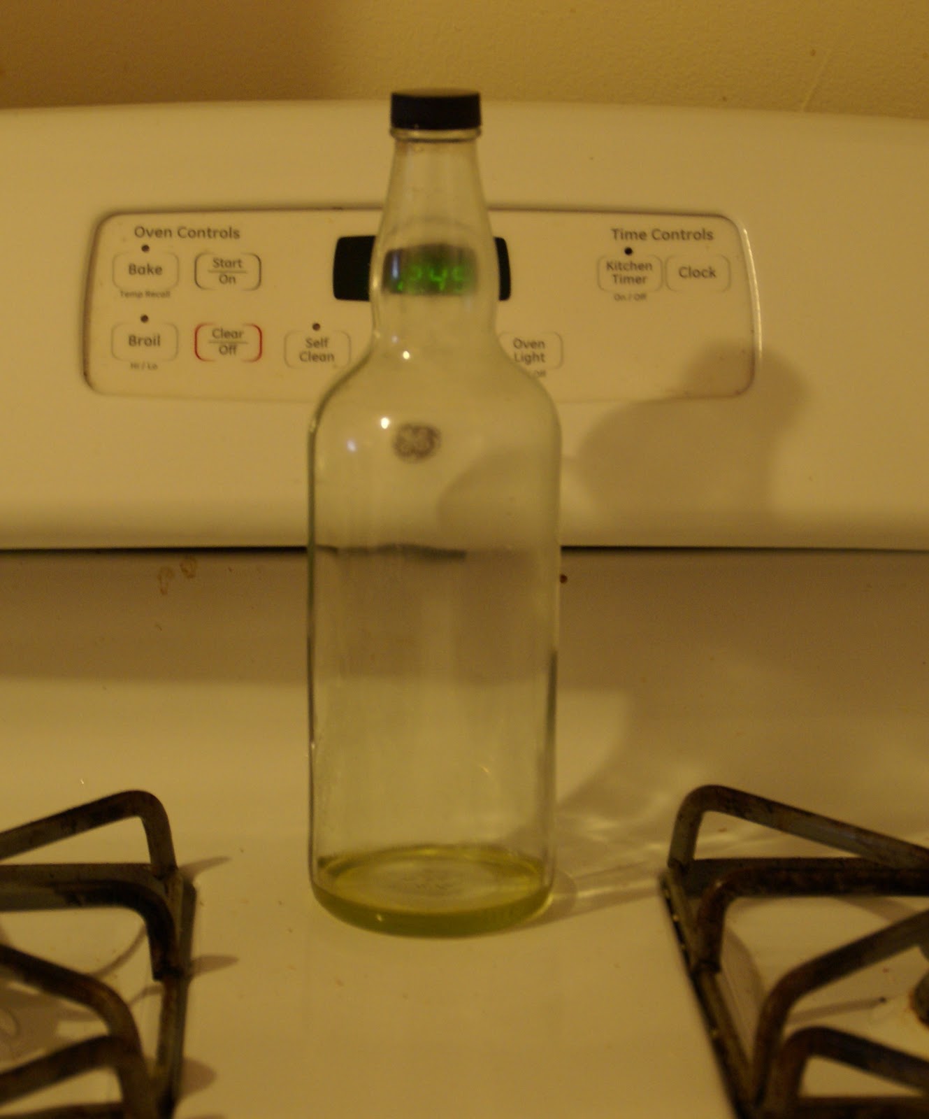 Grill A Chef Getting Every Last Drop Out of That Olive Oil Bottle.