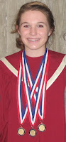 Granddaughter in choir robe with 3 medals