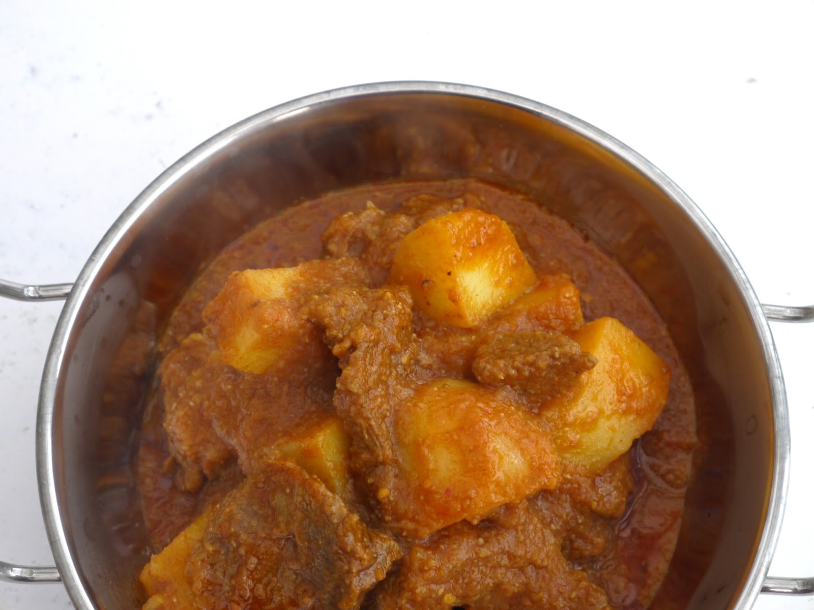 This Muslim Girl Bakes Lamb Potato Curry Aloo Gosht.