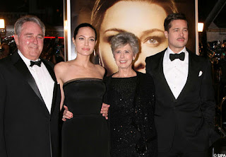 Angelina Jolie on red carpet with Brad pitt and his parent