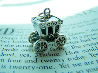 silver pendant,carriage,jewelry,sculpture