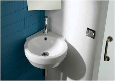 Ahorra espacio en el baño con lavabos esquineros
