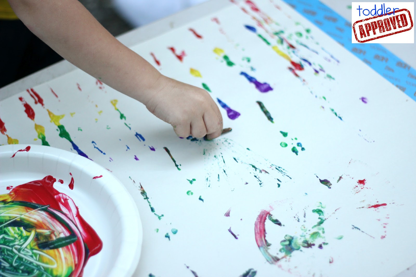 Toddler Approved! Rainbow Stick Painting
