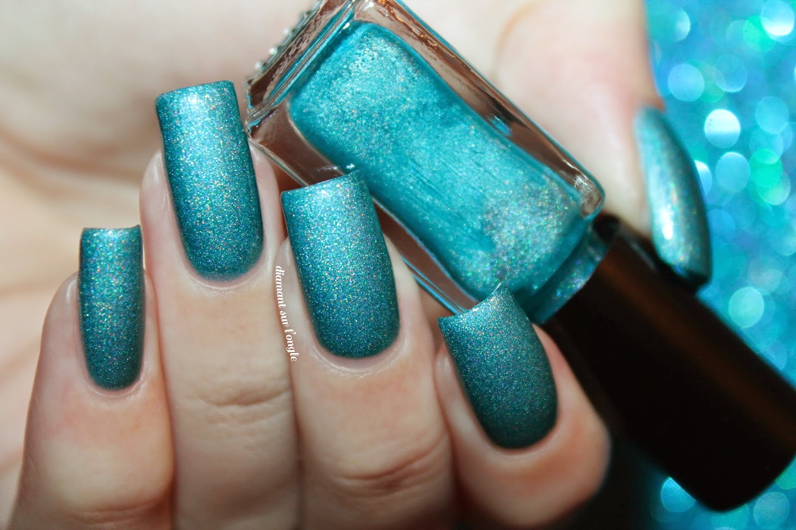 Swatch of a teal holographic franken nail polish
