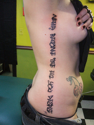 tattoo quotes on ribs for girls. Tattoos On Rib Cage For Girls