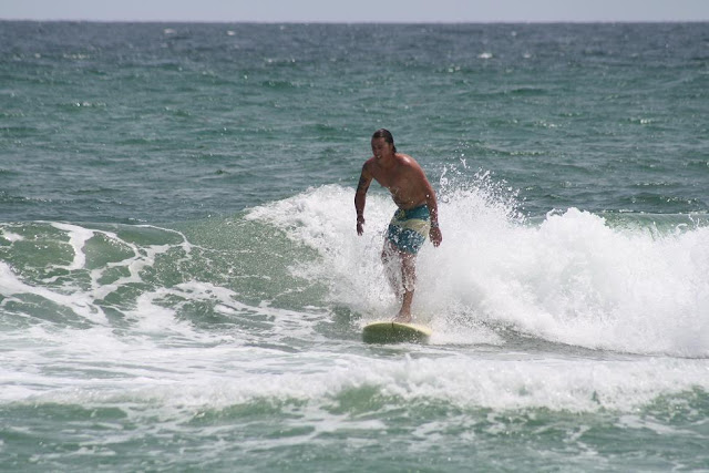 Longboarder Surfing at Pensacola Beach on Sunday May 13, 2012