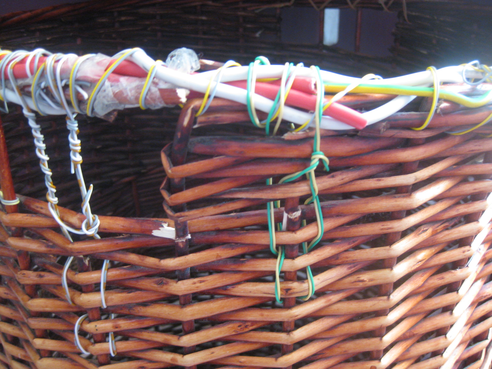 Fixing a wicker washing basket!