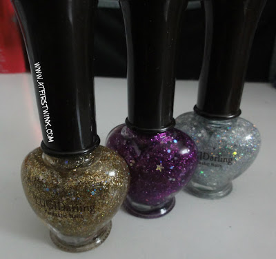 Etude House glitter nail polishes in gold, purple and silver.