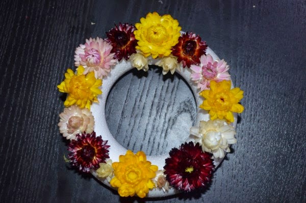 First row of flowers on the wreath First row of flowers