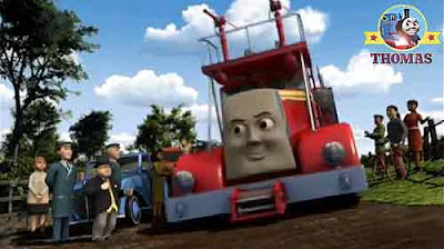 Stand back for red fire truck engine Flynn the champion the Fat Controller watching mass of people