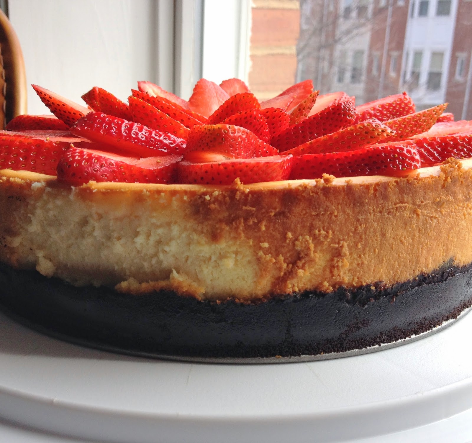 NY Cheesecake...with a thick Oreo Crust and Strawberries.