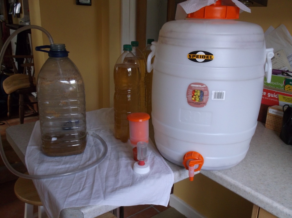 The Compost Bin Mounds of produce from the garden, bottling
