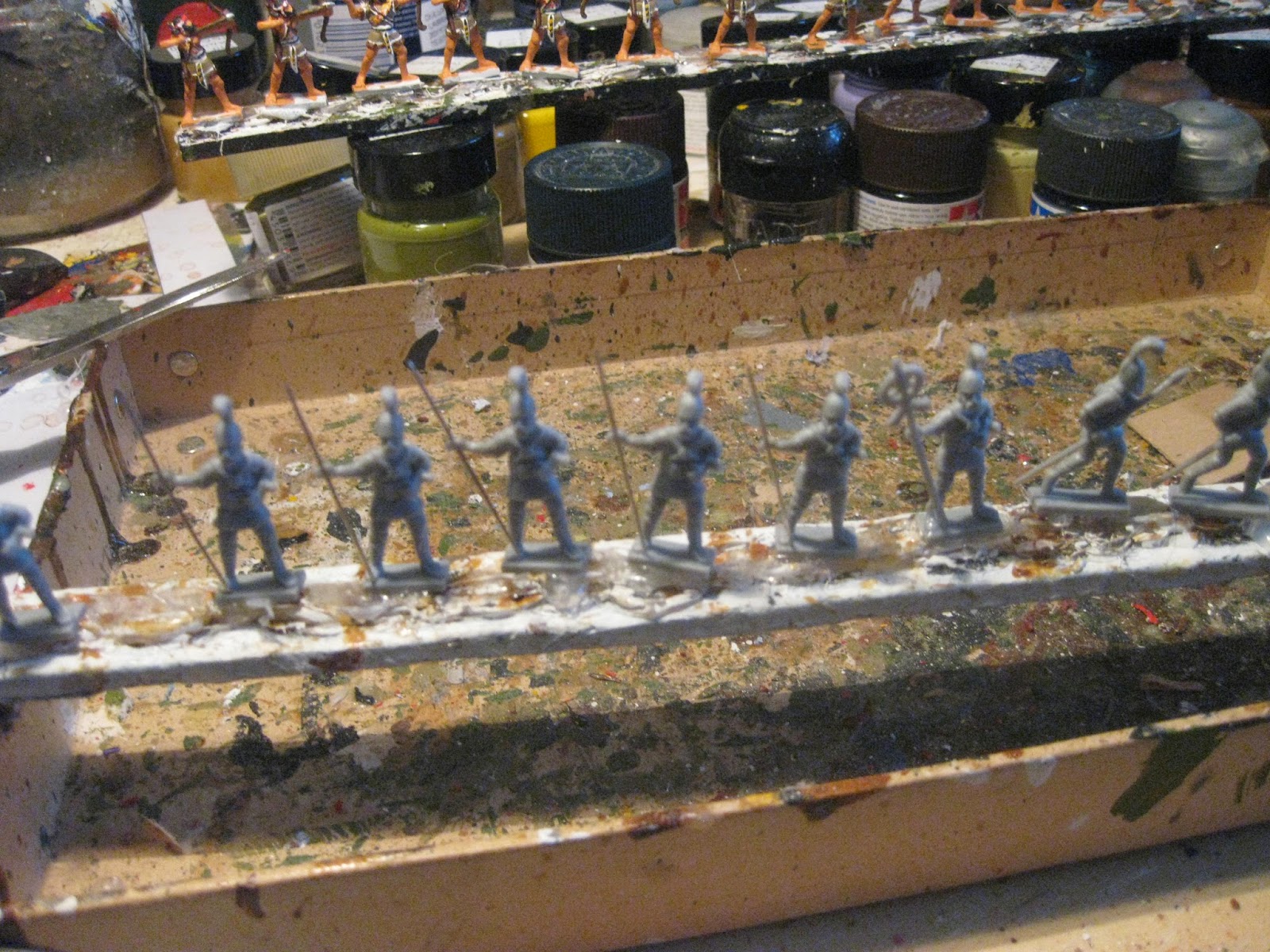Painting soft plastic toy soldiers