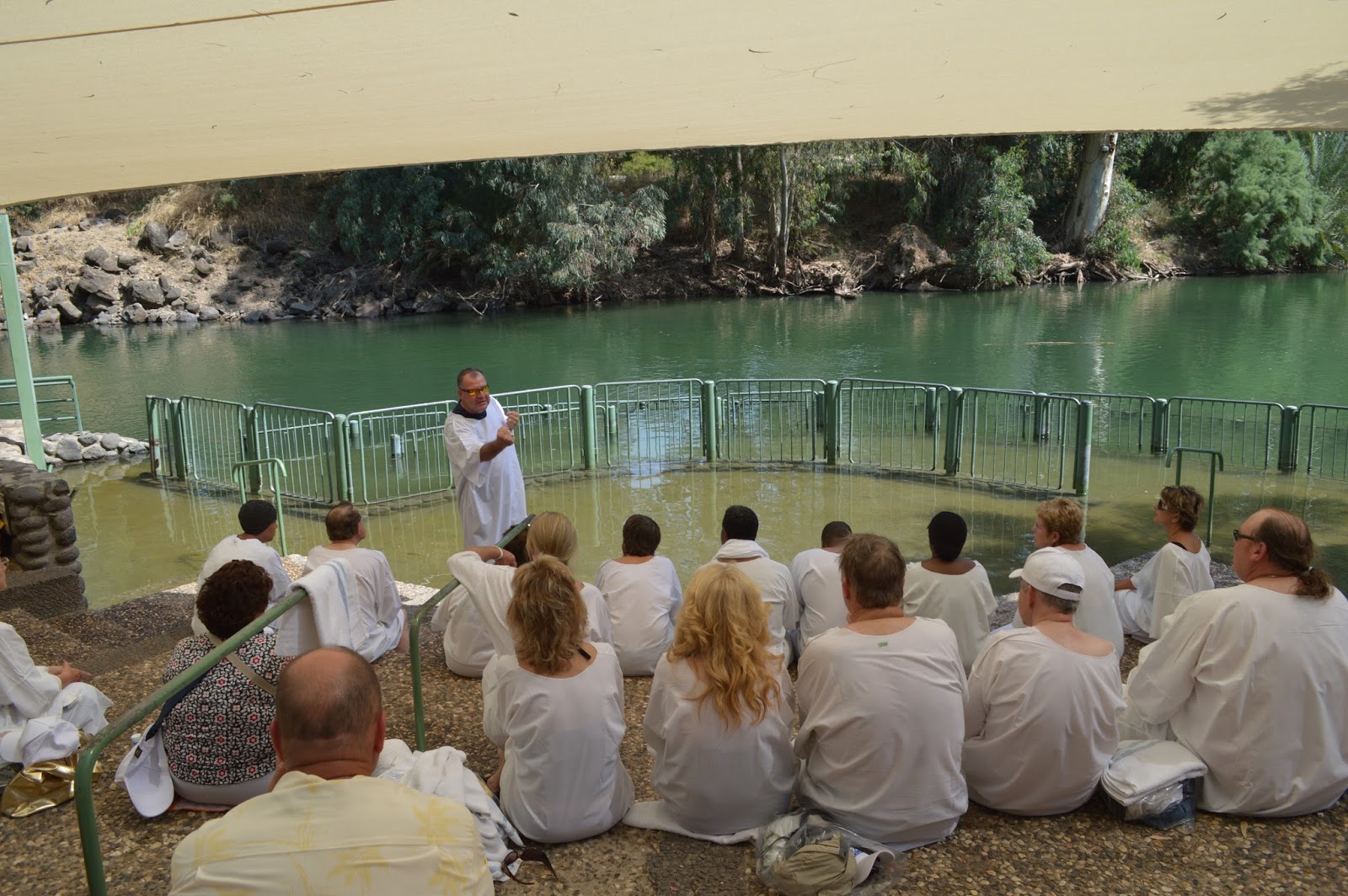 Explore Israel with LeSEA Tours Baptism in the Jordan River!