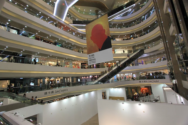 Inside view of Times Square shopping mall with the steep escalator in Causeway Bay, Hong Kong Inside view of Times Square shopping mall with the steep escalator in Causeway Bay, Hong Kong