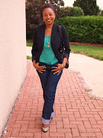 look green tee-shirt and animal print shoes