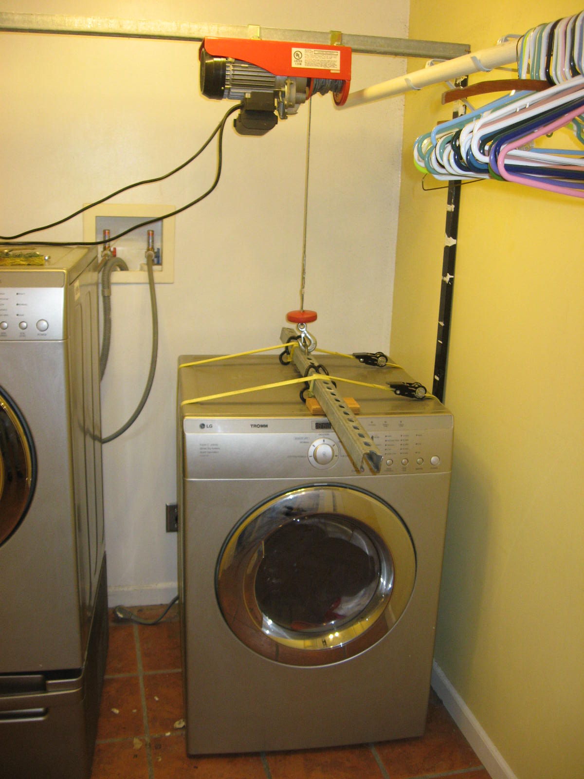 HomenAuto Painting and installing used LG washer and dryer pedestals.