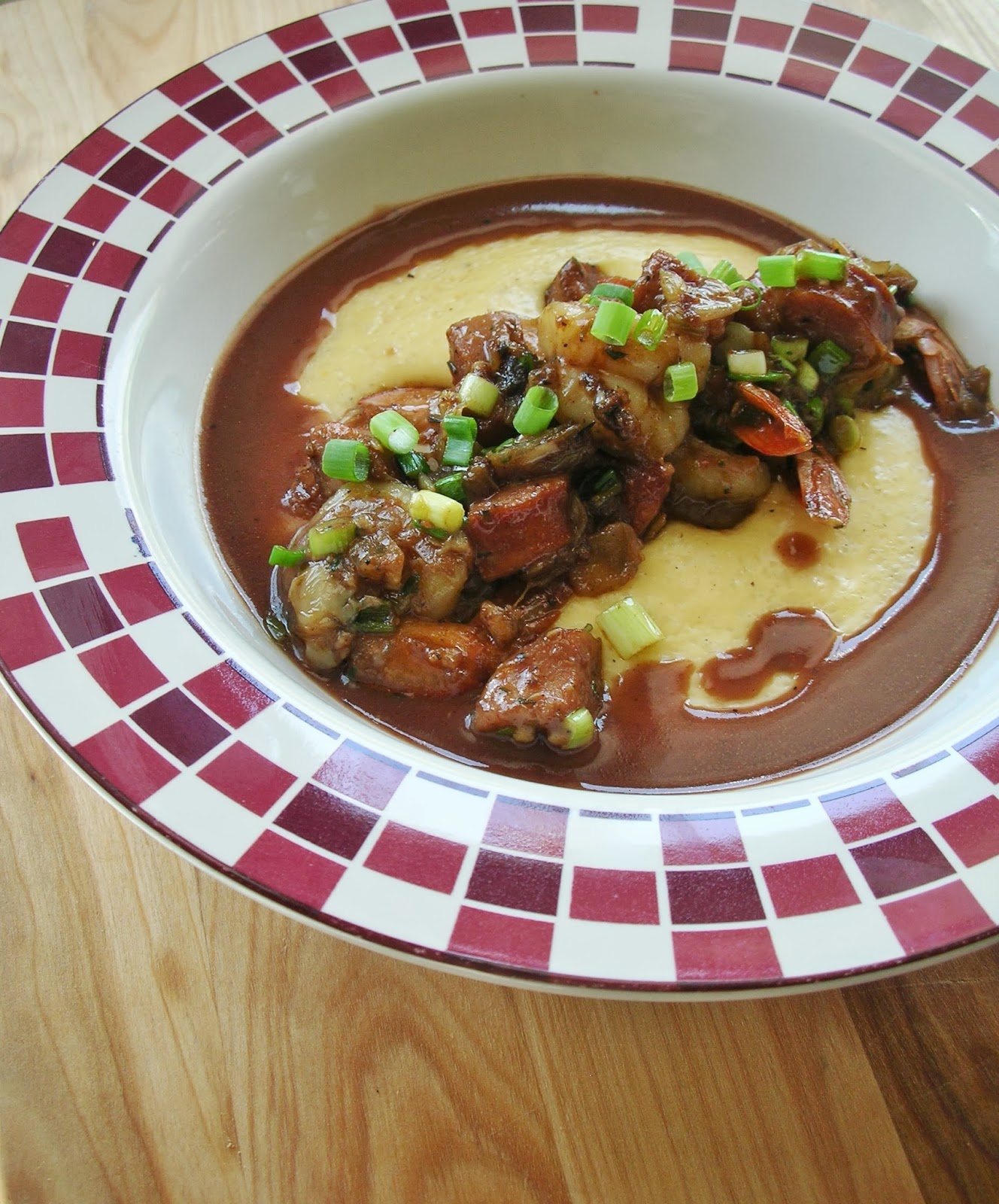Basil Shrimp and Andouille with Cheese Grits and Red Wine Gravy