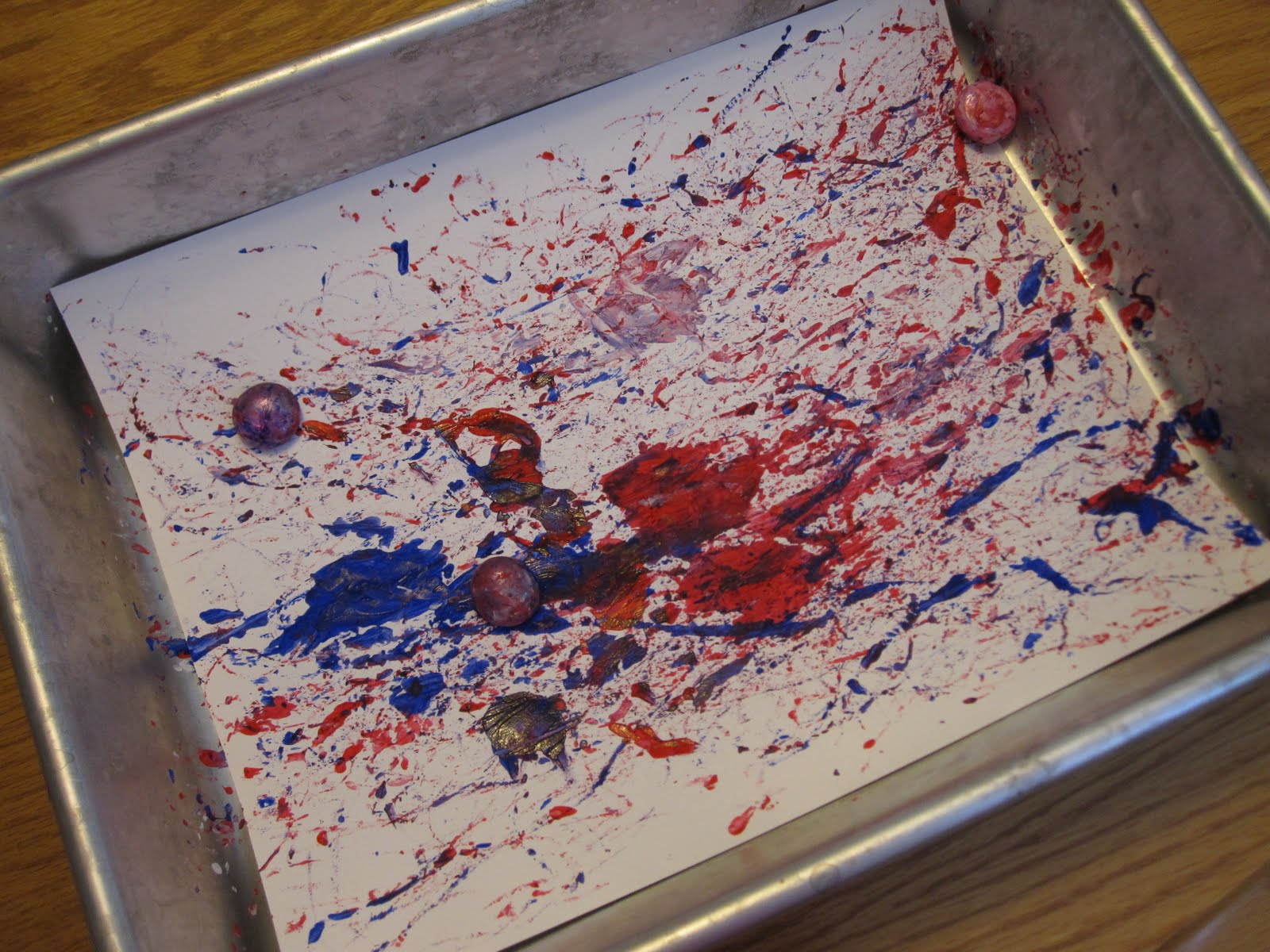 Toddler Approved! Red, White, and Blue Ball Painting